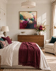 The Mother framed canvas print in a light editorial bedroom