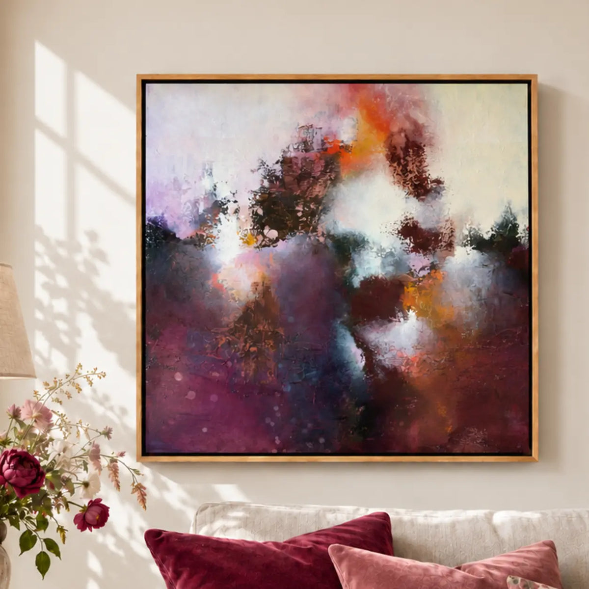 Sunrise Ruby framed canvas print, close-up in a light-filled living room