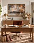 Where Heaven Meets Earth framed canvas print in a woman’s office